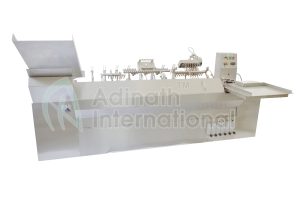 High Speed Ampoule Filling and Sealing Machine | Adinath Pharma Machinery High Speed Ampoule Filling and Sealing Machine