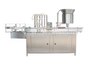 High Speed Vial Filling and Rubber Stoppering Machine | Adinath Pharma Machinery High Speed Vial Filling and Rubber Stoppering Machine